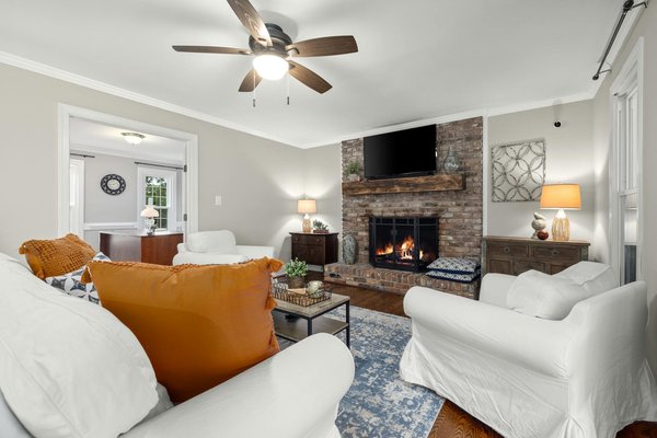 How does grassroots sports development impact community cohesion in the UK?